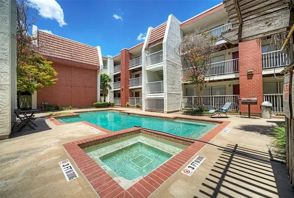 a view of a house with swimming pool