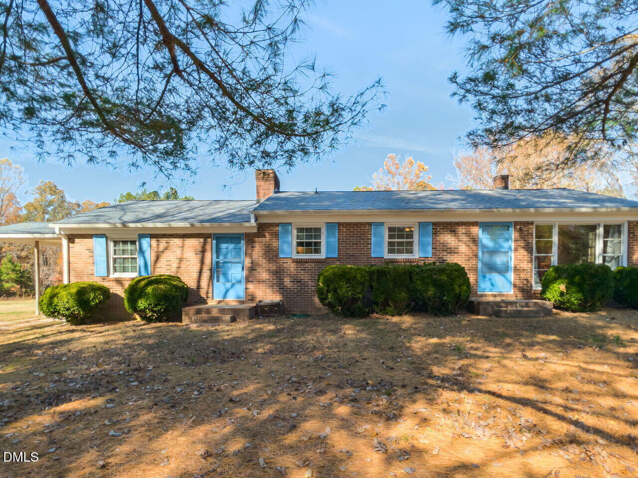 269 Beaver Dam Road Norlina, NC 27563 - Photo 12 of 38 a front view of a house with a yard and outdoor seating