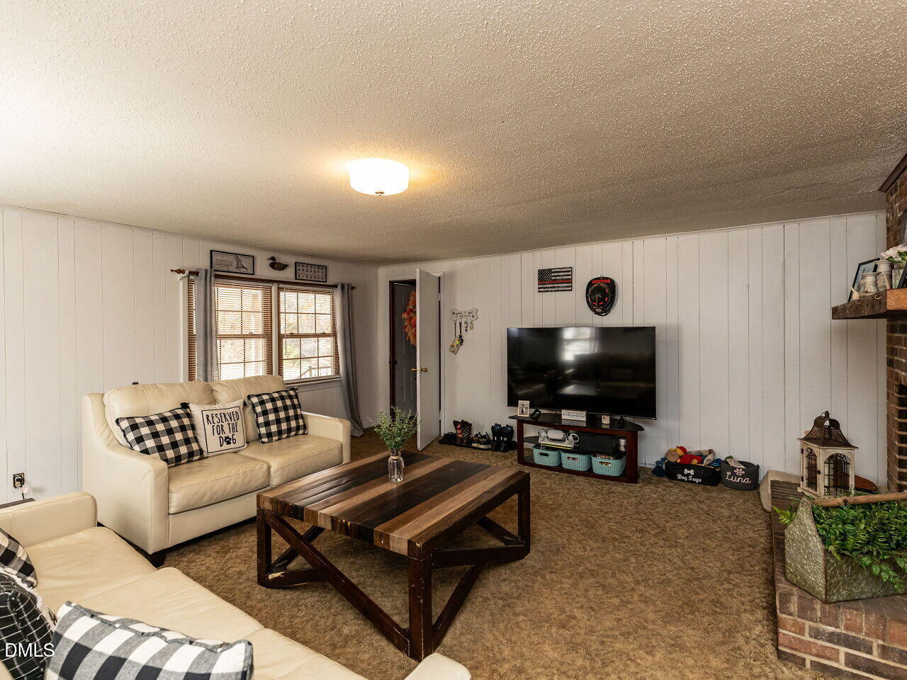 269 Beaver Dam Road Norlina, NC 27563 - Photo 14 of 38 a living room with furniture and a flat screen tv