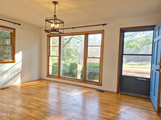 wooden floor and closet in a room