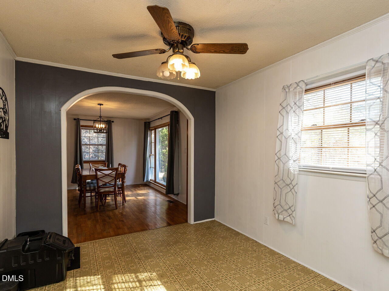 269 Beaver Dam Road Norlina, NC 27563 - Photo 20 of 38 a view of a livingroom with furniture chandelier fan and windows