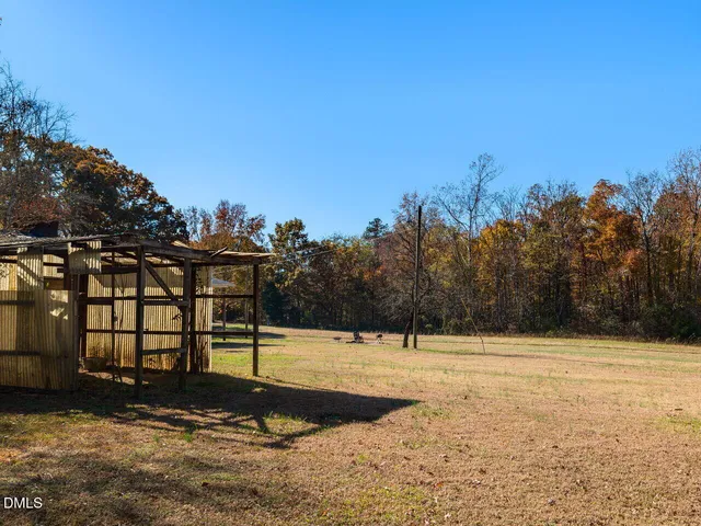 a view of a yard with an outdoor space