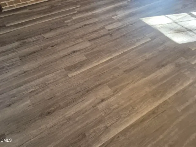 a kitchen with stainless steel appliances a refrigerator a stove and a sink