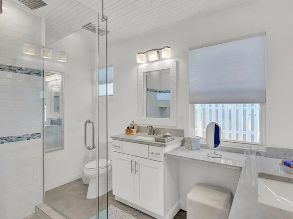 a outdoor space with lots of furniture and a chandelier