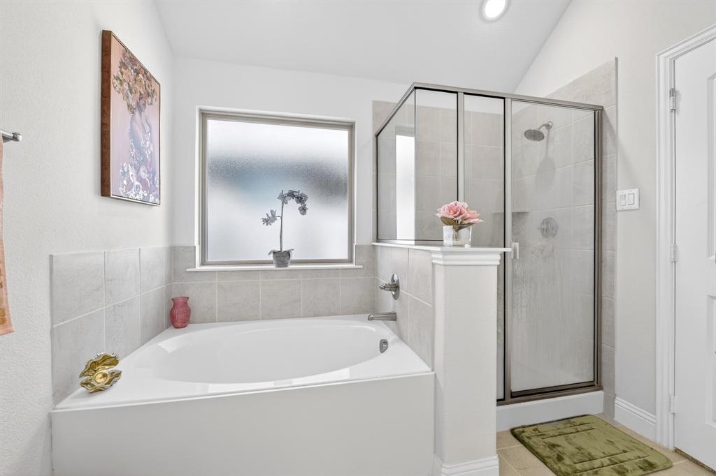 136 Gleeson Drive Red Oak, TX 75154 - Photo 27 of 40 a white bath tub sitting next to a white sink