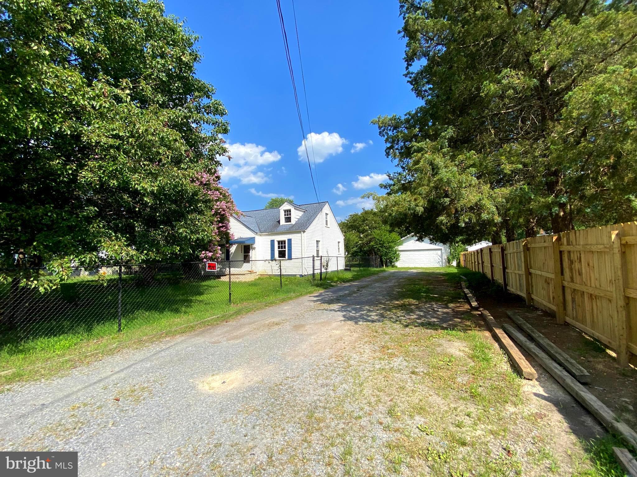 13304 Crain Highway Brandywine, MD 20613 - Photo 2 of 17 a view of a backyard with a garden