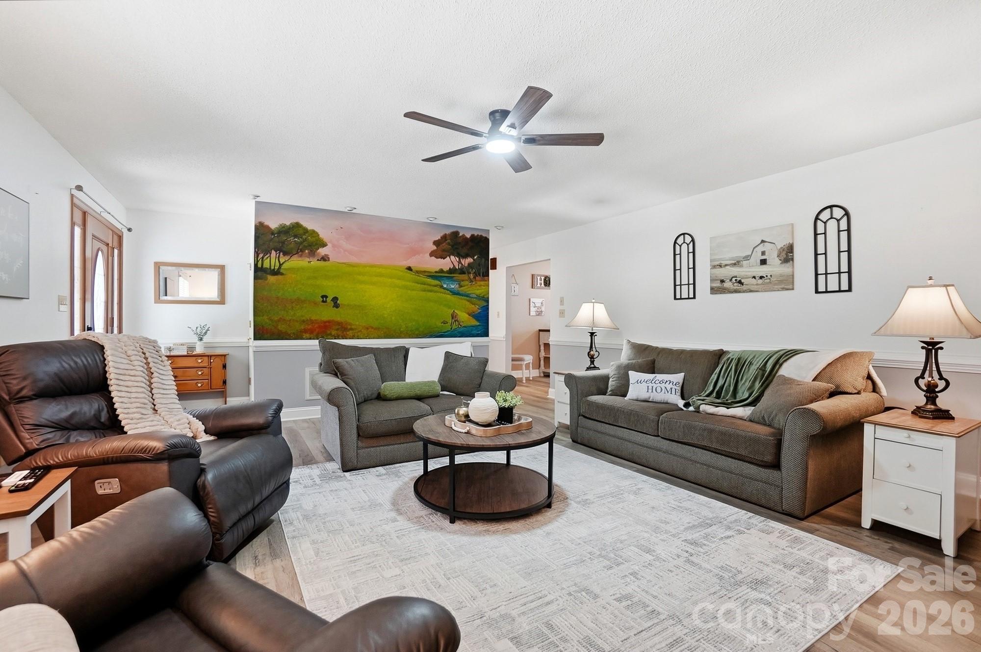 4017 Mullis Newsome Road Monroe, NC 28110 - Photo 15 of 38 a living room with furniture and a flat screen tv