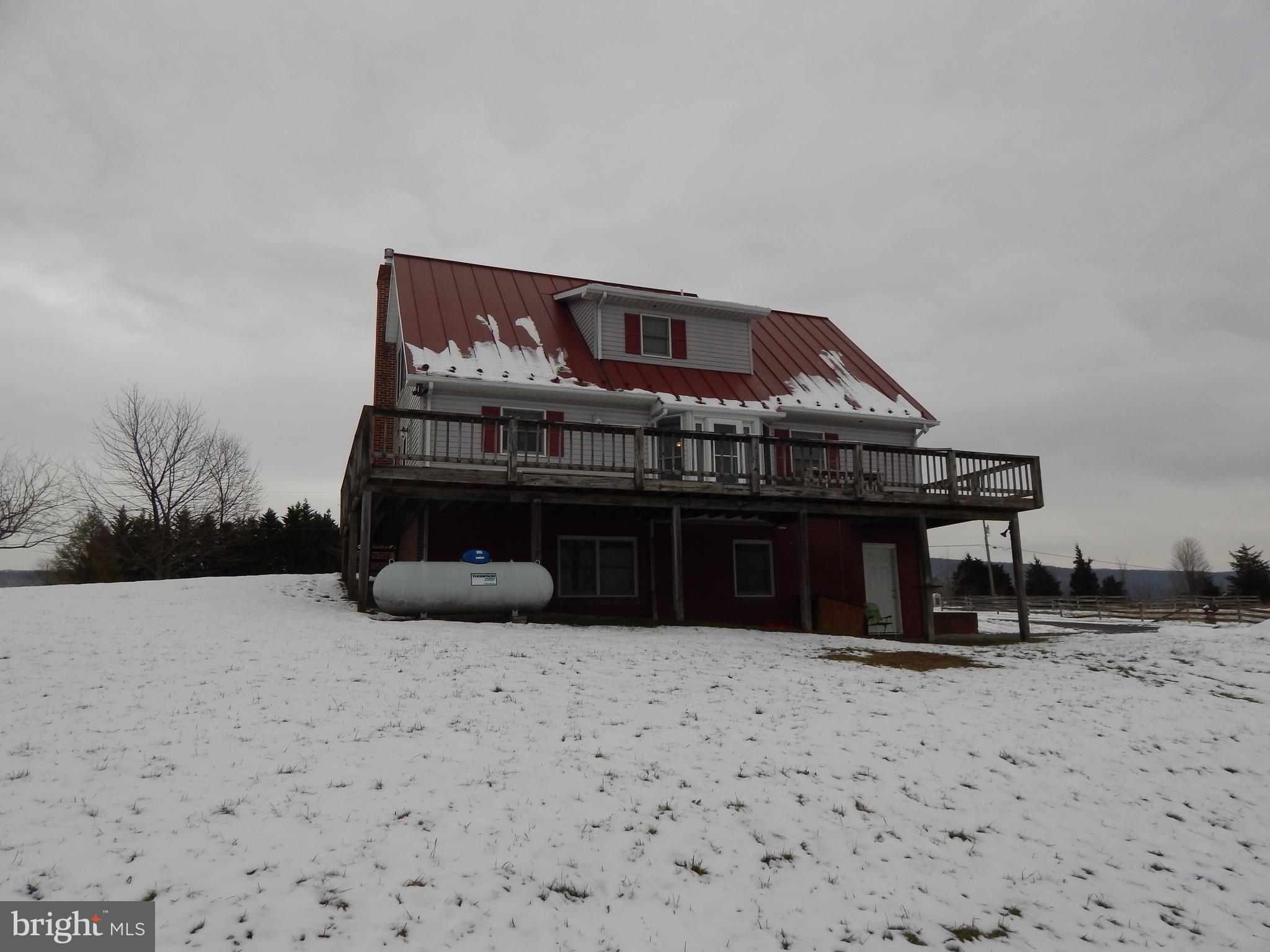 3320 Highland Ridge Road Berkeley Springs, WV 25411 - Photo 22 of 32 BAck view with deck