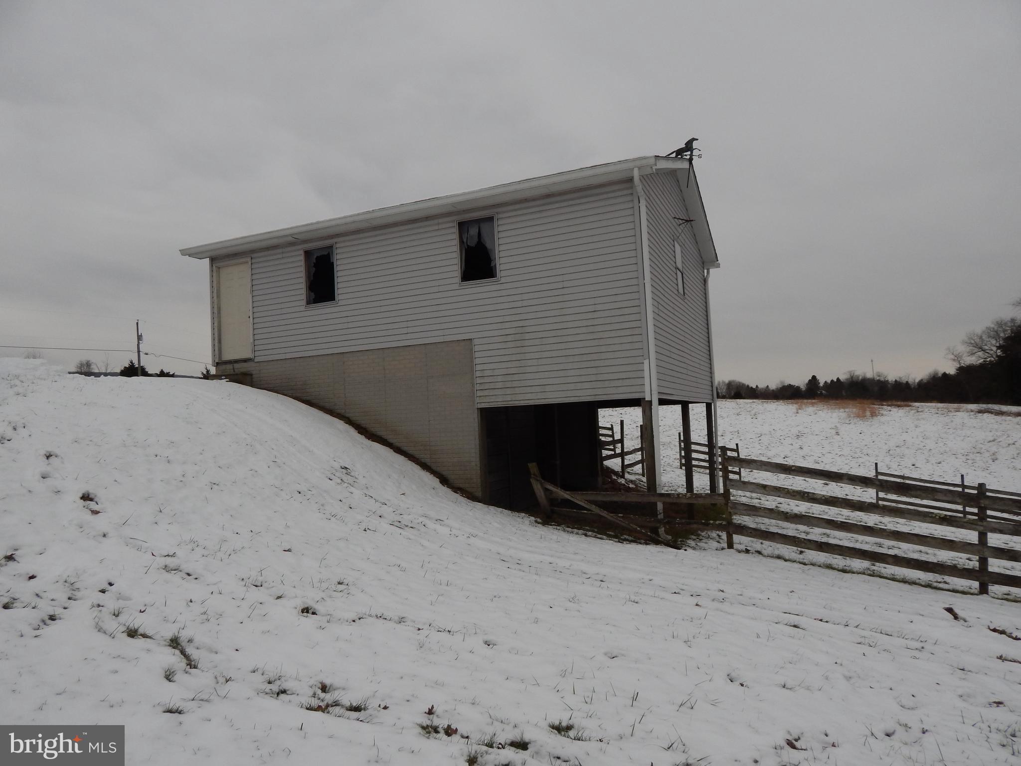 3320 Highland Ridge Road Berkeley Springs, WV 25411 - Photo 23 of 32 Workshop with lower level stables