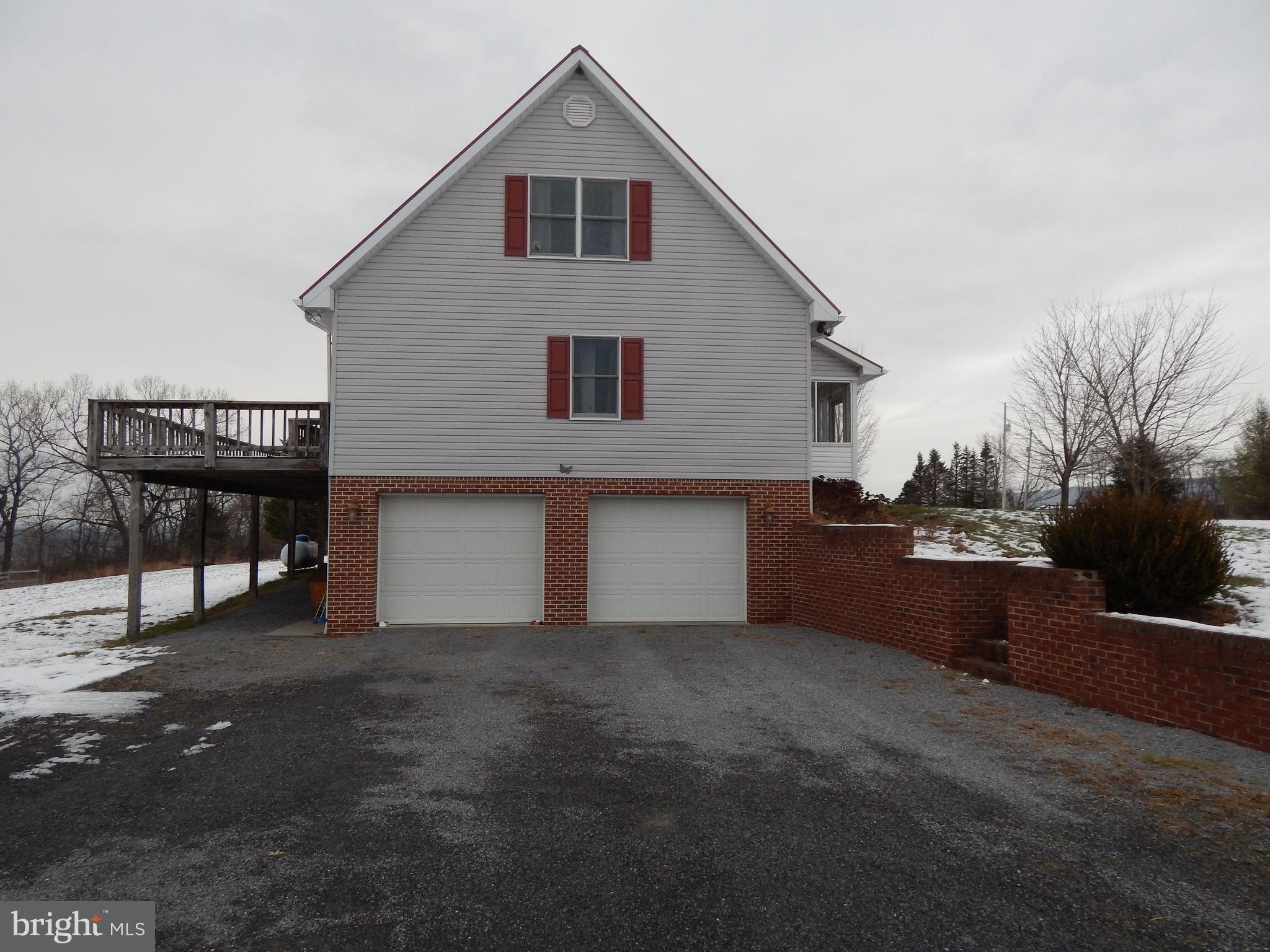 3320 Highland Ridge Road Berkeley Springs, WV 25411 - Photo 26 of 32 Side view from driveway