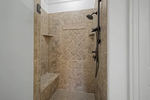 a spacious bathroom with a tub and a sink