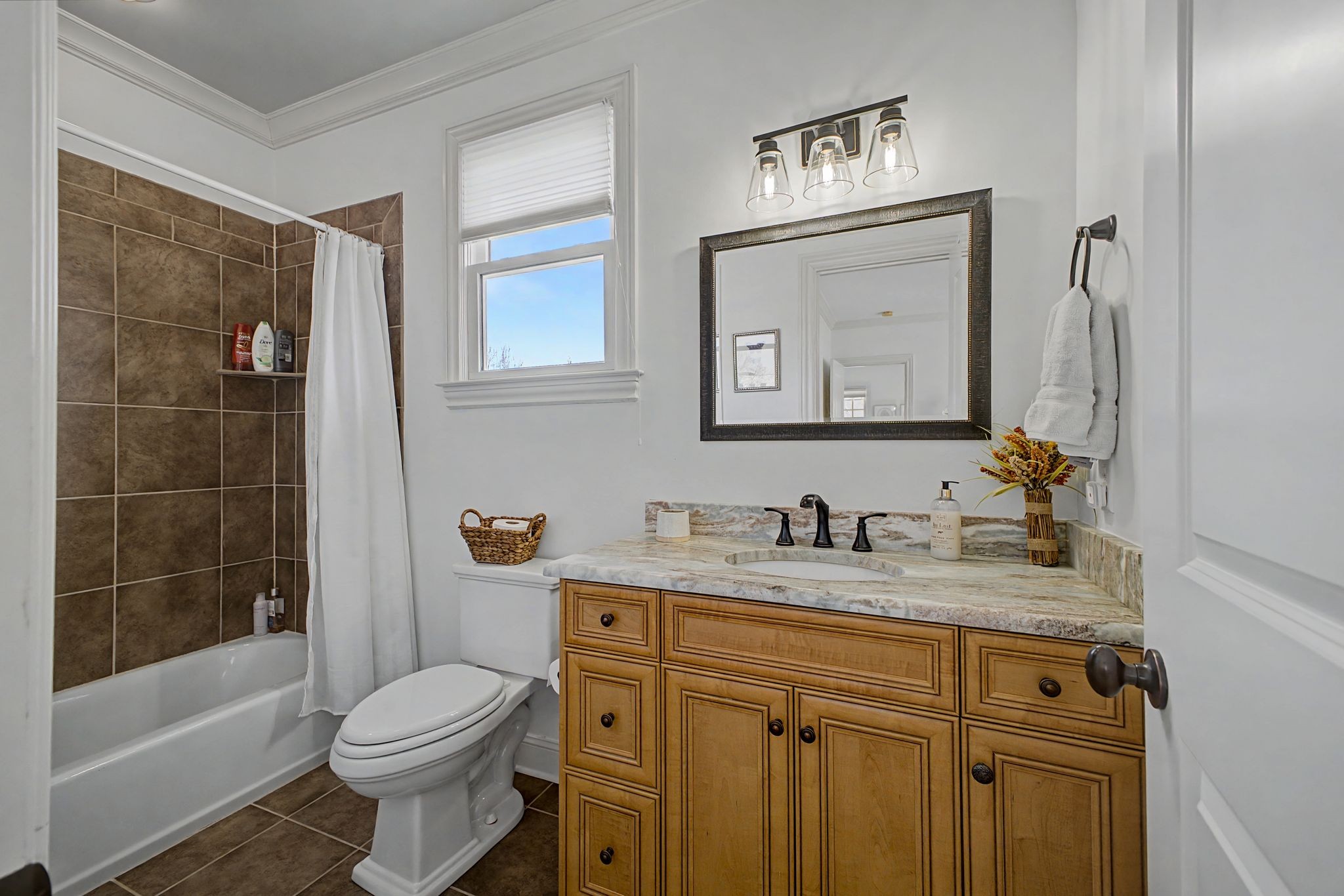 626 Band Drive Franklin, TN 37064 - Photo 39 of 53 a bathroom with a granite countertop toilet sink and a mirror