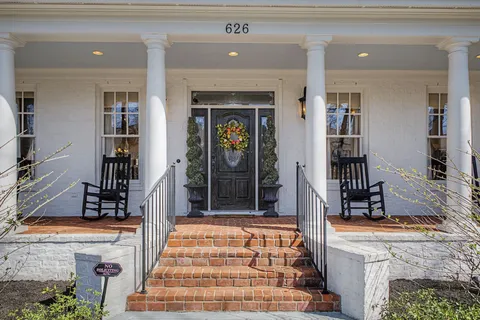 a front view of a house with a fireplace