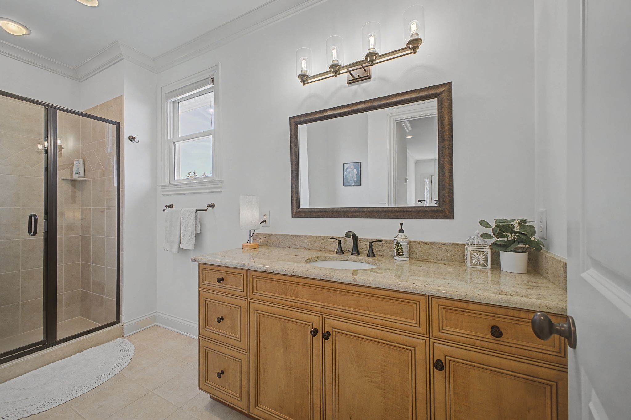626 Band Drive Franklin, TN 37064 - Photo 45 of 53 a bathroom with double vanity sink a two mirror and shower