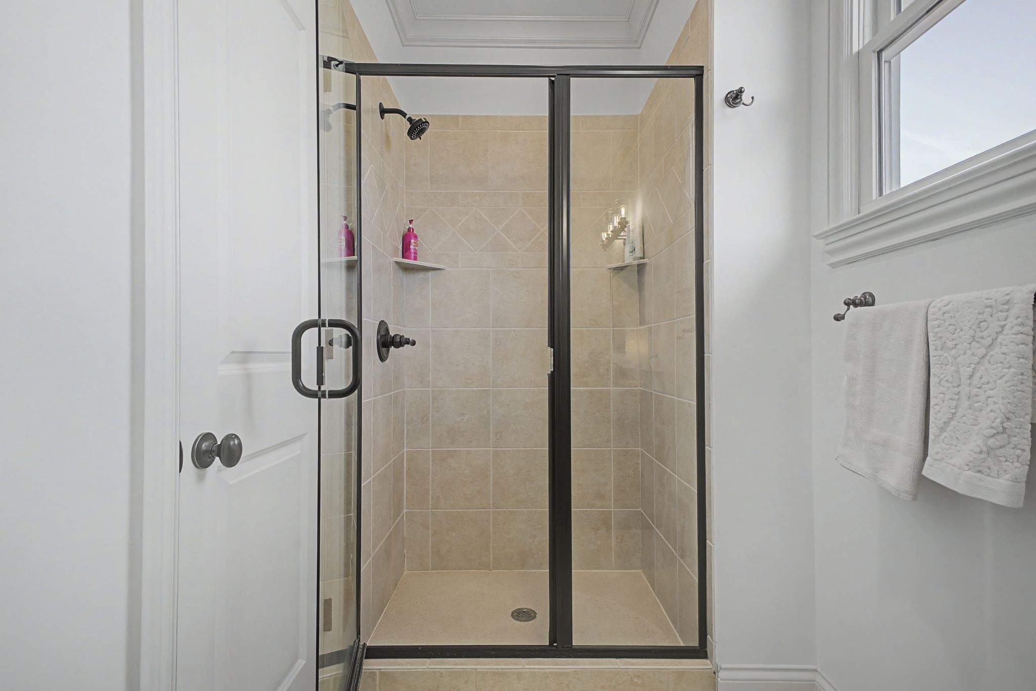 626 Band Drive Franklin, TN 37064 - Photo 46 of 53 a bathroom with a glass shower door