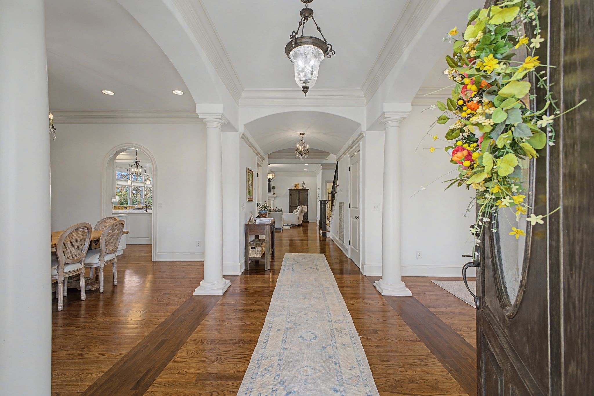626 Band Drive Franklin, TN 37064 - Photo 6 of 53 a view of a hallway to a livingroom with furniture