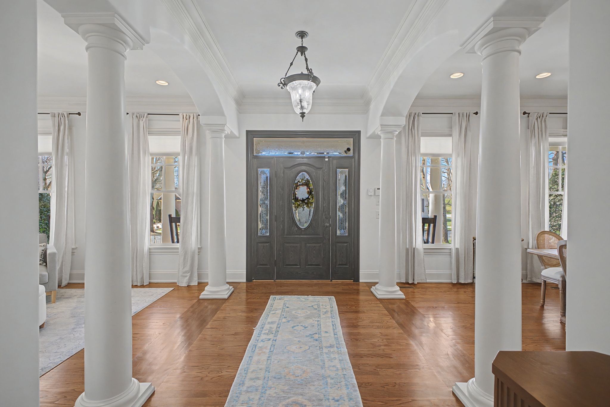 626 Band Drive Franklin, TN 37064 - Photo 7 of 53 a hallway with wooden floor and windows