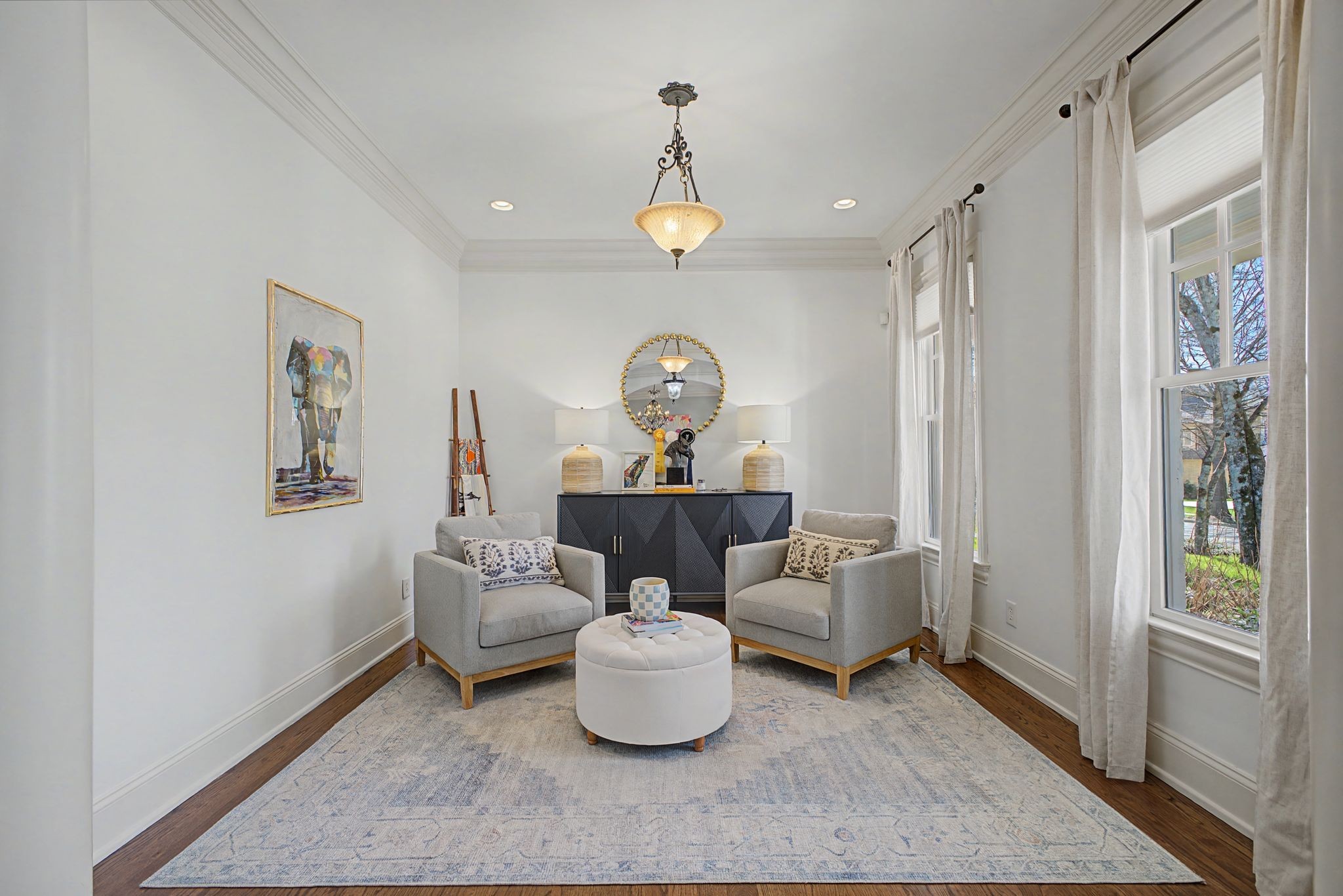 626 Band Drive Franklin, TN 37064 - Photo 10 of 53 a living room with furniture and a chandelier