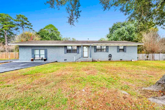 a view of a house with a swimming pool