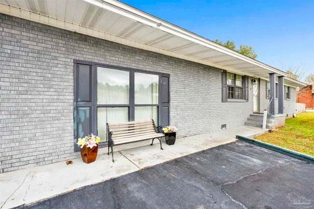 a view of house with outdoor space