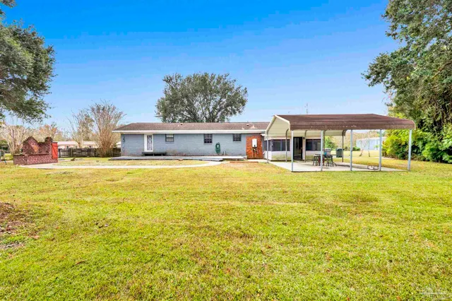 a view of a house with a swimming pool