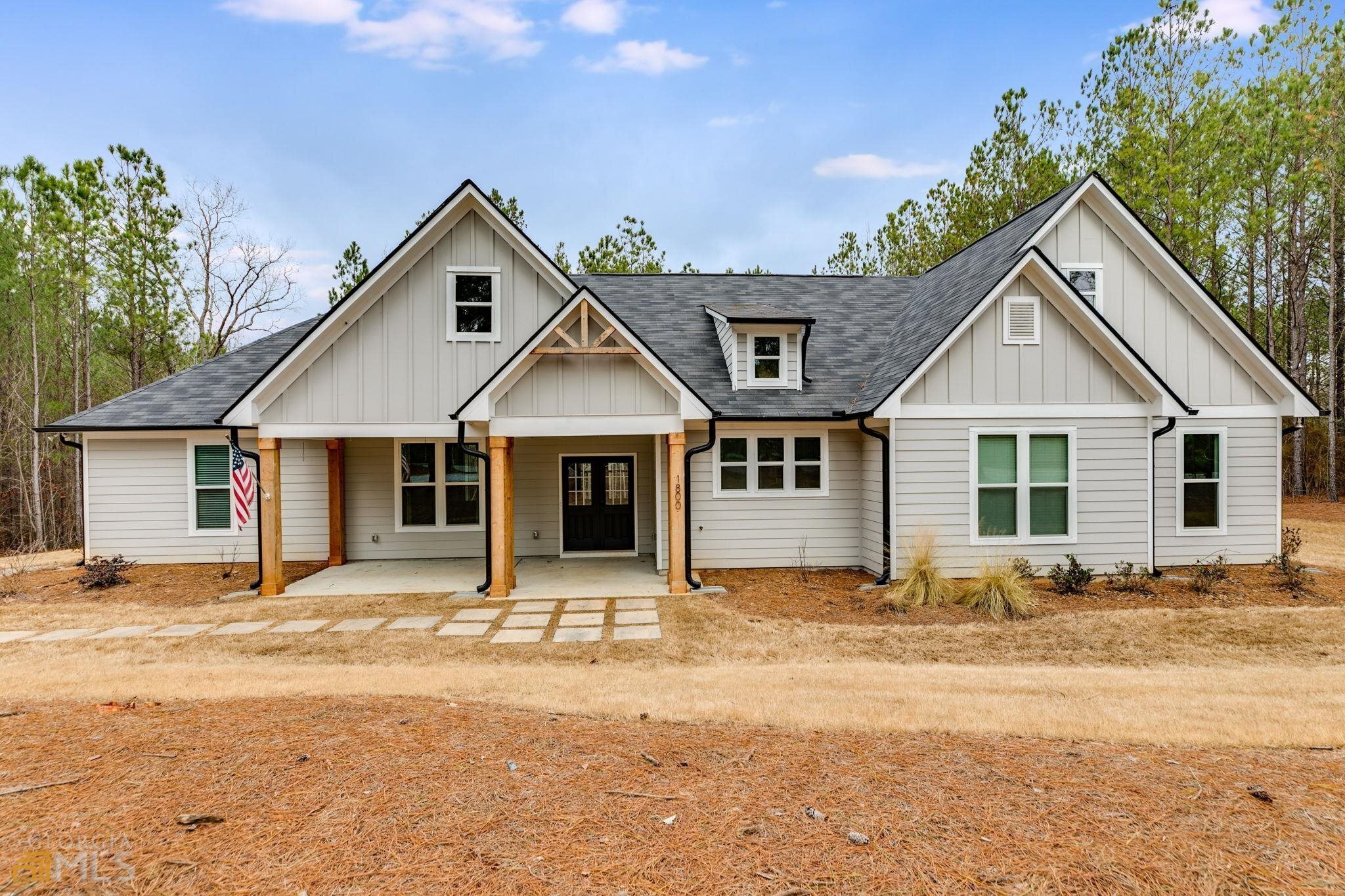 1800 Notnomis Road Franklin, GA 30217 - Photo 1 of 1 a front view of a house with a yard covered in snow