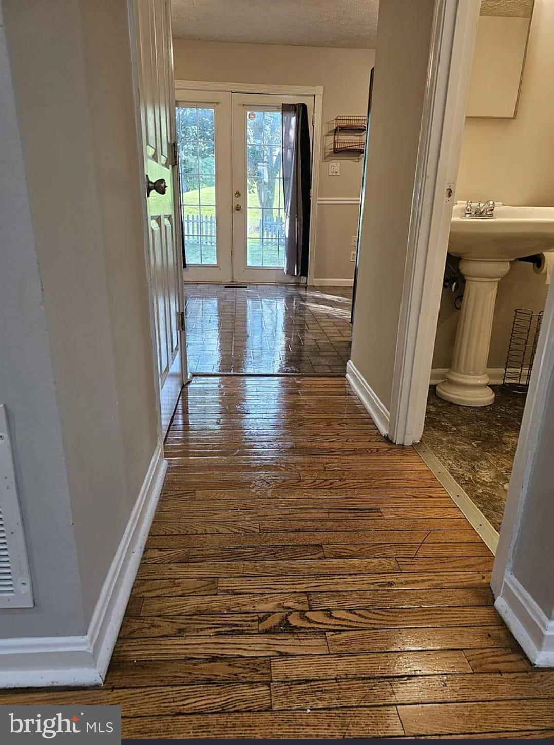 604 Burlington Court Edgewood, MD 21040 - Photo 2 of 7 a view of entryway and hall with wooden floor