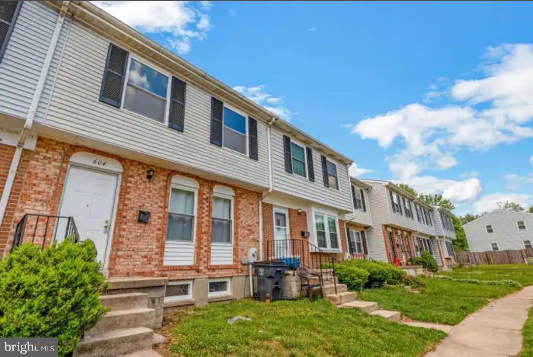604 Burlington Court Edgewood, MD 21040 - Photo 6 of 7 a front view of a house with a yard