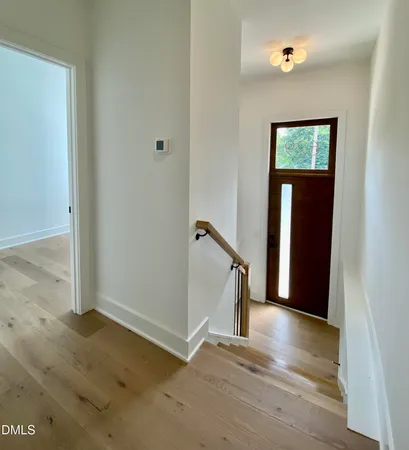 a living room with a bed and furniture