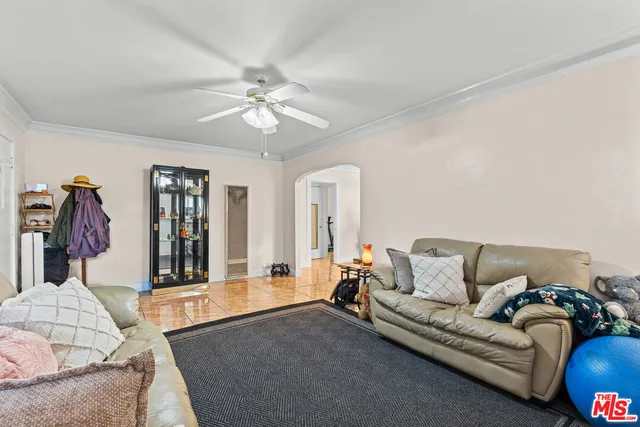 a living room with furniture and window