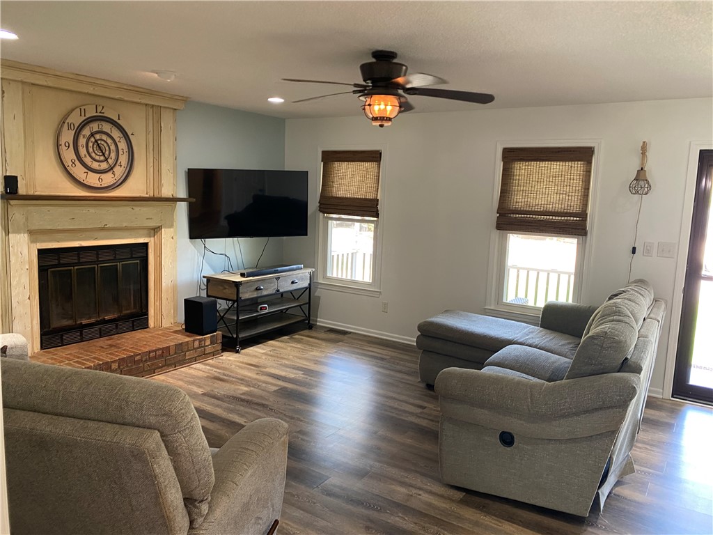 210 Twin Lakes Drive Anderson, SC 29621 - Photo 17 of 44 This inviting living space features a cozy fireplace, perfect for relaxing evenings at home.
