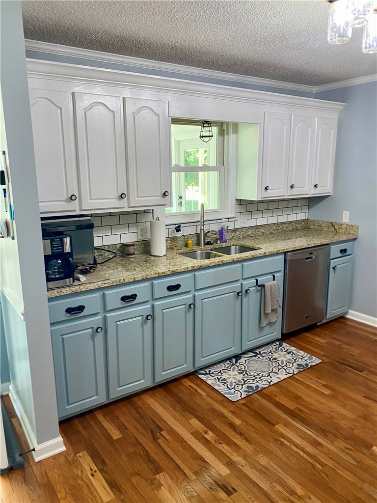 210 Twin Lakes Drive Anderson, SC 29621 - Photo 20 of 44 This bright kitchen features ample cabinetry and beautiful flooring.