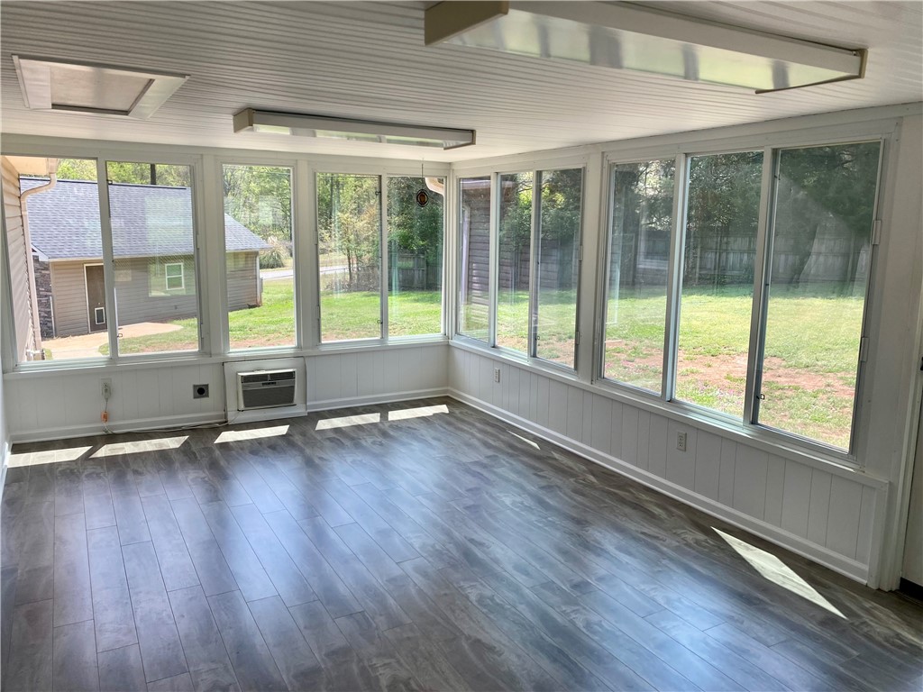 210 Twin Lakes Drive Anderson, SC 29621 - Photo 26 of 44 This sunroom provides abundant natural light, offering expansive views of the surrounding outdoor space.