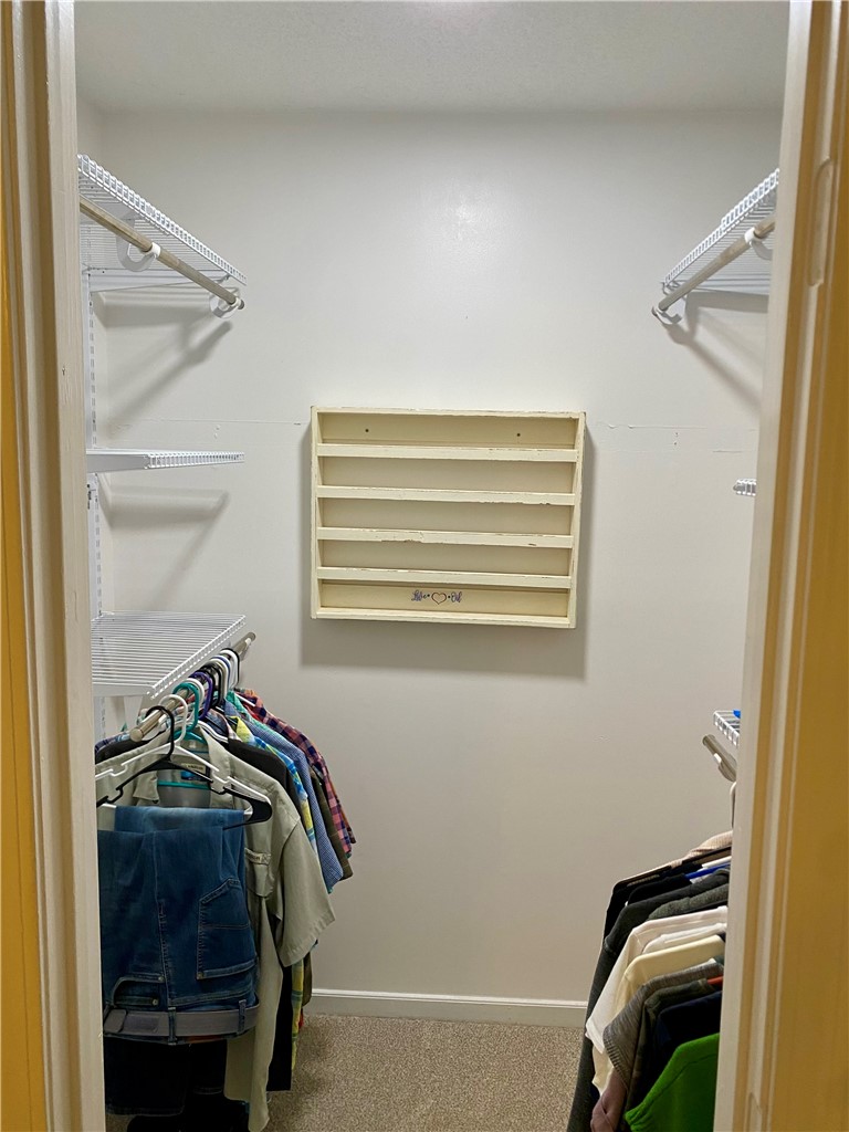 210 Twin Lakes Drive Anderson, SC 29621 - Photo 29 of 44 This organized walk-in closet features ample hanging space and shelving.