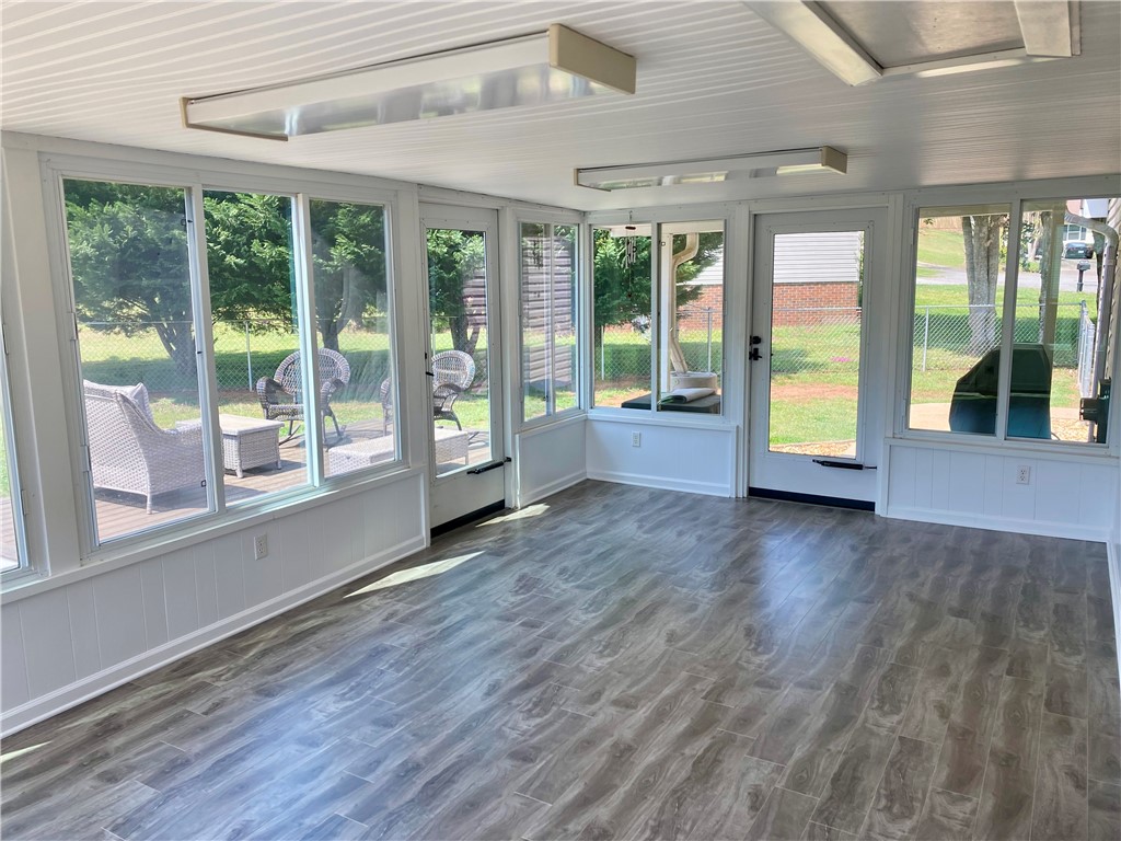 210 Twin Lakes Drive Anderson, SC 29621 - Photo 32 of 44 This bright sunroom offers expansive views and versatile indoor-outdoor living.