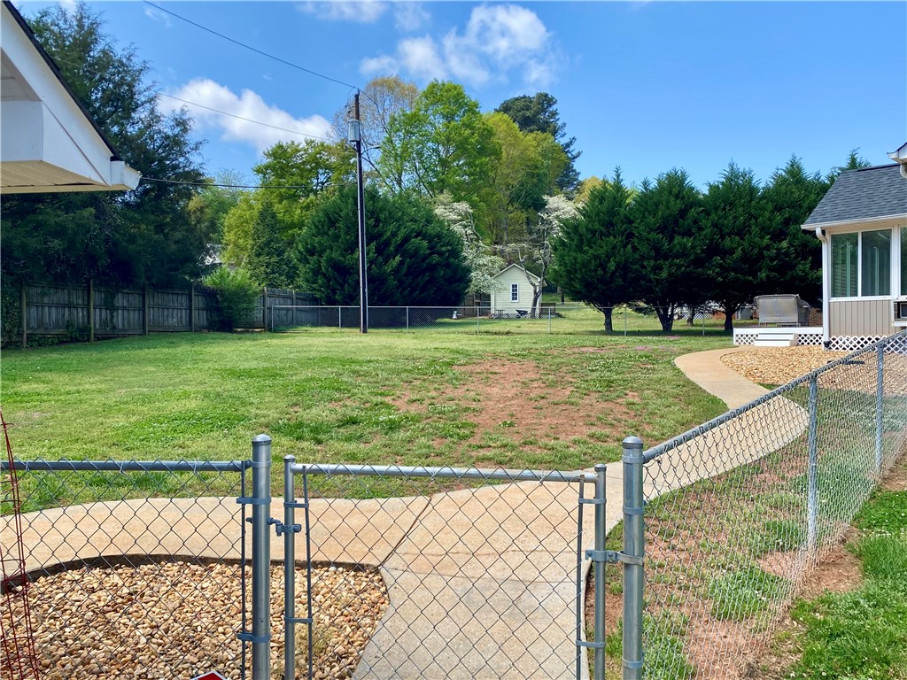 210 Twin Lakes Drive Anderson, SC 29621 - Photo 33 of 44 Expansive green space provides a private yard for outdoor enjoyment.