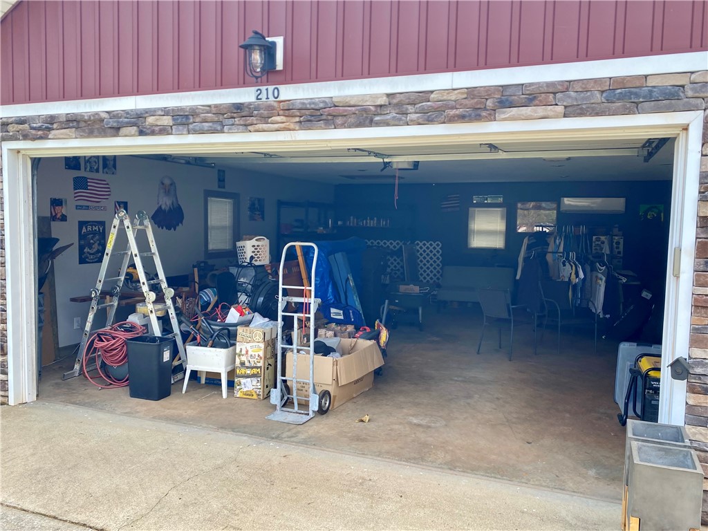 210 Twin Lakes Drive Anderson, SC 29621 - Photo 36 of 44 This spacious garage offers ample storage and direct access, perfect for any homeowner.