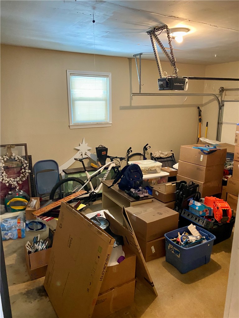 210 Twin Lakes Drive Anderson, SC 29621 - Photo 40 of 44 This functional garage provides ample storage space and convenient access to the outdoors.