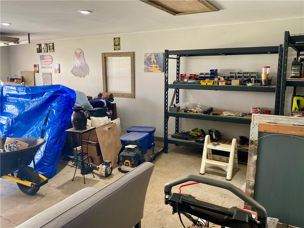 210 Twin Lakes Drive Anderson, SC 29621 - Photo 44 of 44 This functional garage provides ample space for storage and organization.