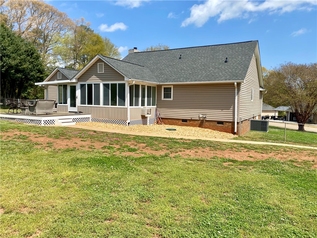 210 Twin Lakes Drive Anderson, SC 29621 - Photo 7 of 44 This charming home features a lovely deck and screened porch, perfect for outdoor enjoyment.