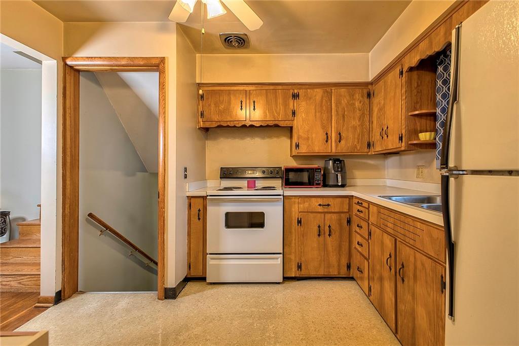 1119 Church Street Indiana, PA 15701 - Photo 9 of 34 a kitchen with a refrigerator stove and sink