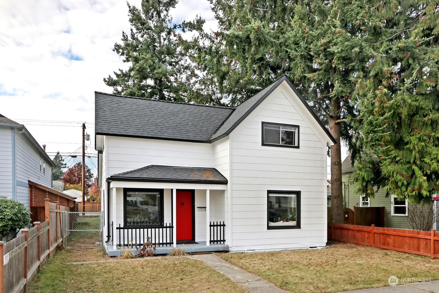 1718 Rockefeller Avenue Everett, WA 98201 - Photo 1 of 17 a front view of a house with garage