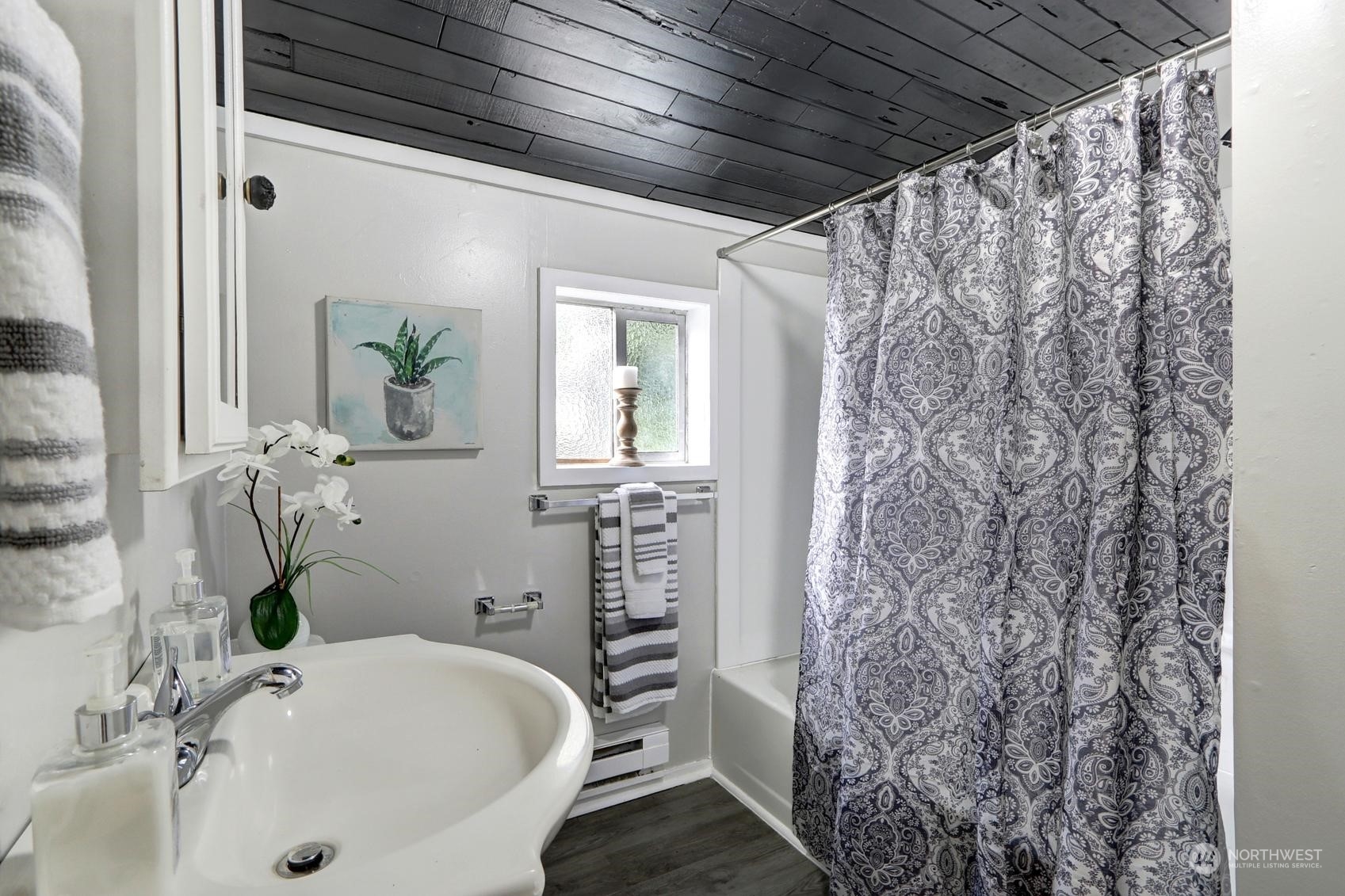 1718 Rockefeller Avenue Everett, WA 98201 - Photo 11 of 17 a bathroom with a sink toilet and shower