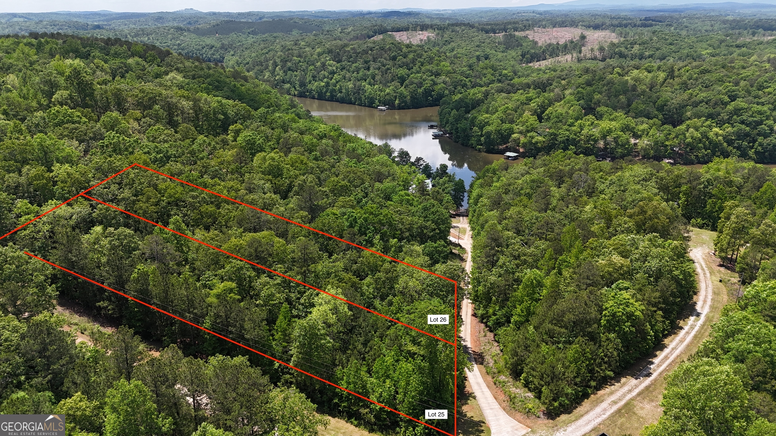 Lot 25 Sawyer Boat Ramp Road Wedowee, AL 36278 - Photo 1 of 2 an aerial view of mountain with trees in the background
