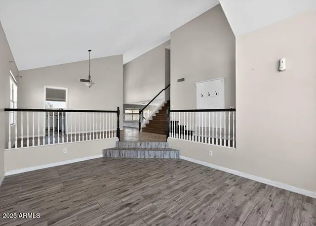 a view of entryway with wooden floor