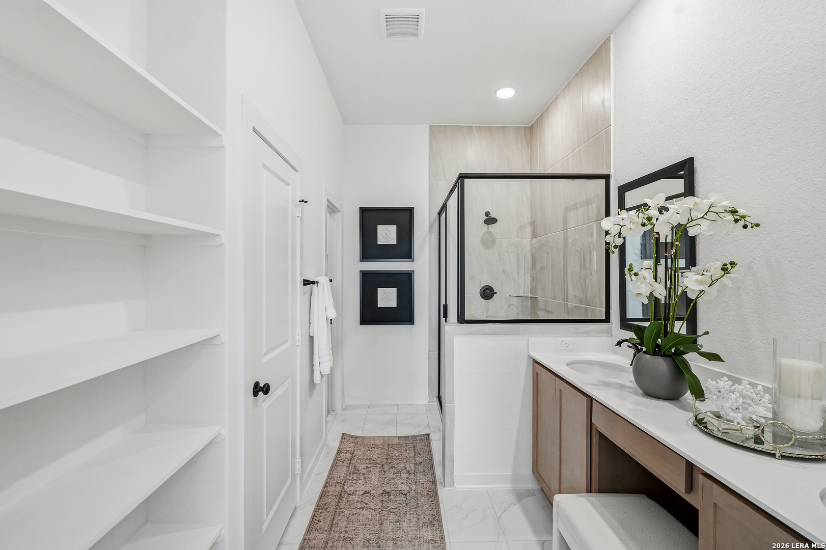 9421 Chatside Schertz, TX 78154 - Photo 14 of 48 a bathroom with sink shower and mirror
