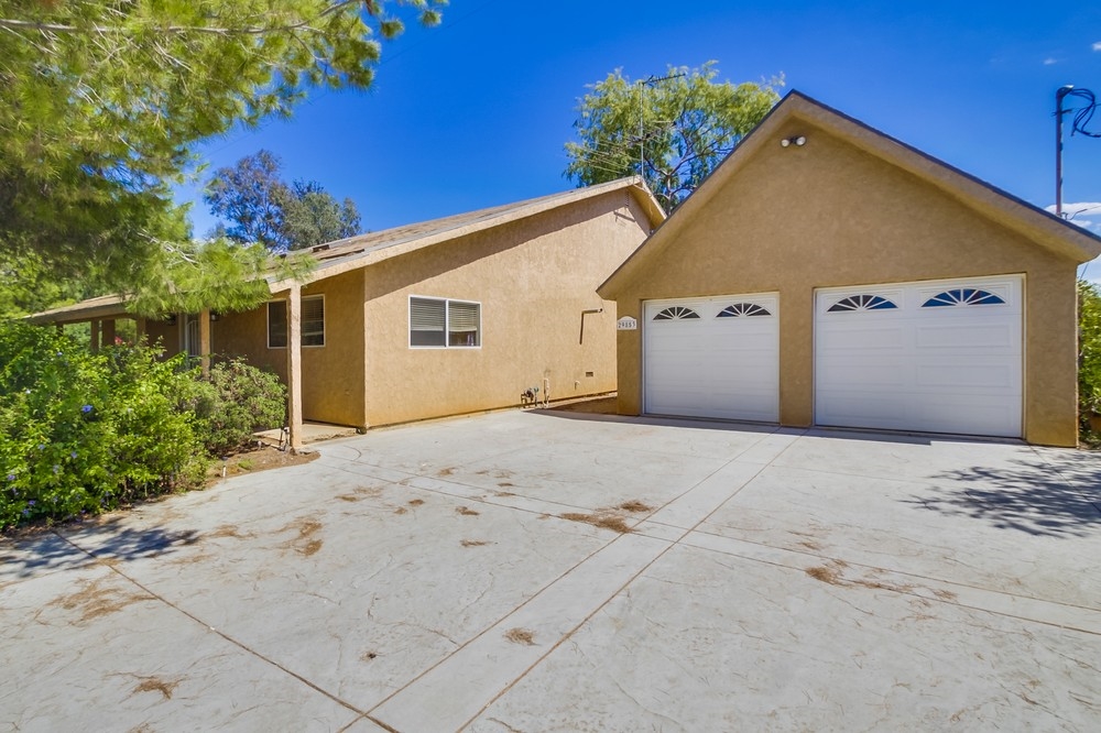 29853 Miller Road Valley Center, CA 92082 - Photo 1 of 25 Plenty of room in garage for cars trucks and storage/work space.