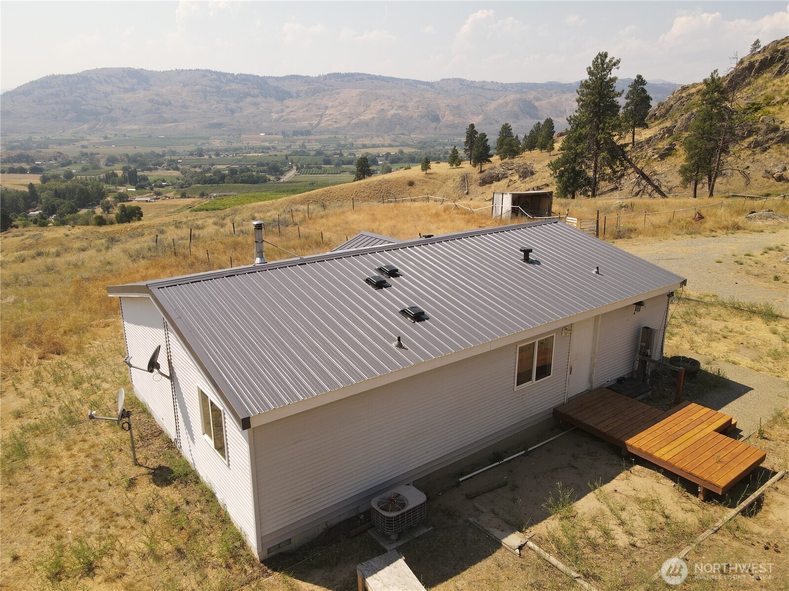 105 Swanson Mill Road Oroville, WA 98844 - Photo 3 of 37 a view of a terrace with a ocean view