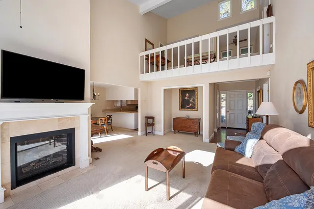 a bed room with a bed and a window