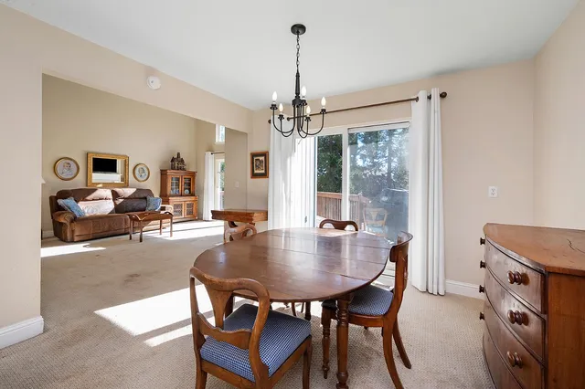 a bedroom with two beds and painted walls
